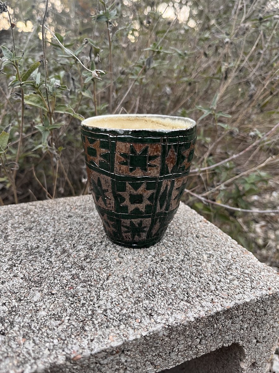 Ceramic cup with quilt block pattern
